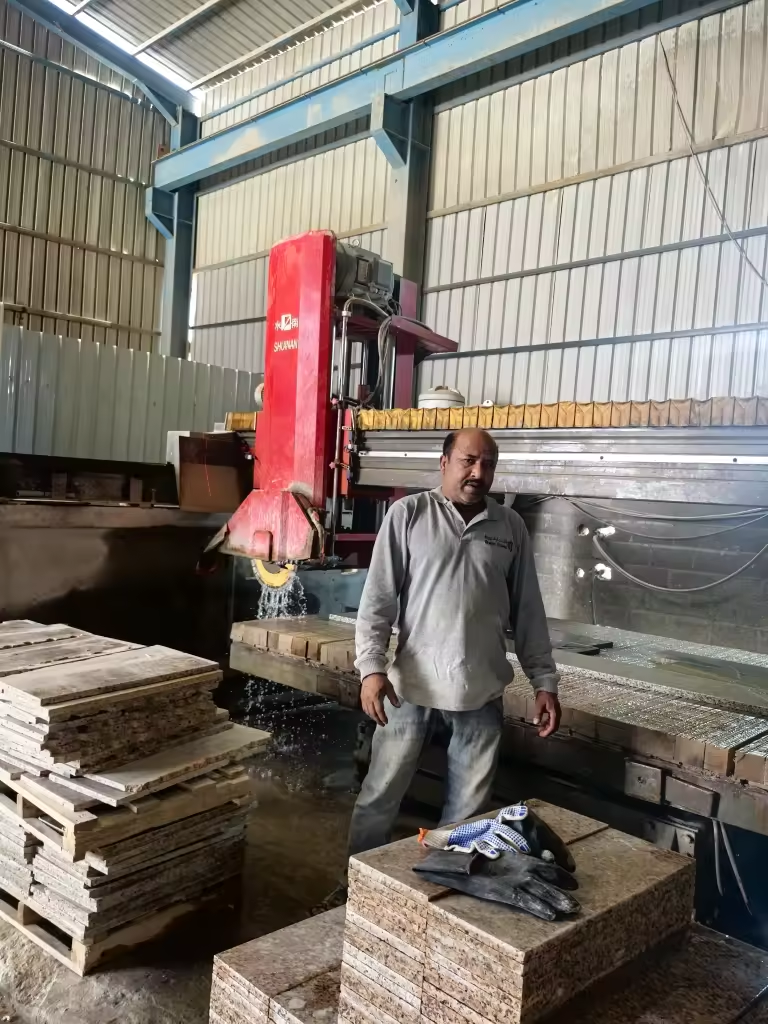 Infrared bridge saw machine cutting granite slabs at customer factory installation by Shuinan Machinery
